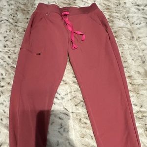Woman’s pink scrub pants